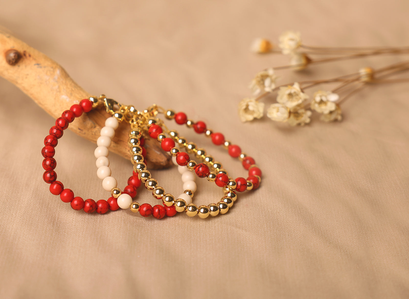 Red and gold beaded baby bracelet