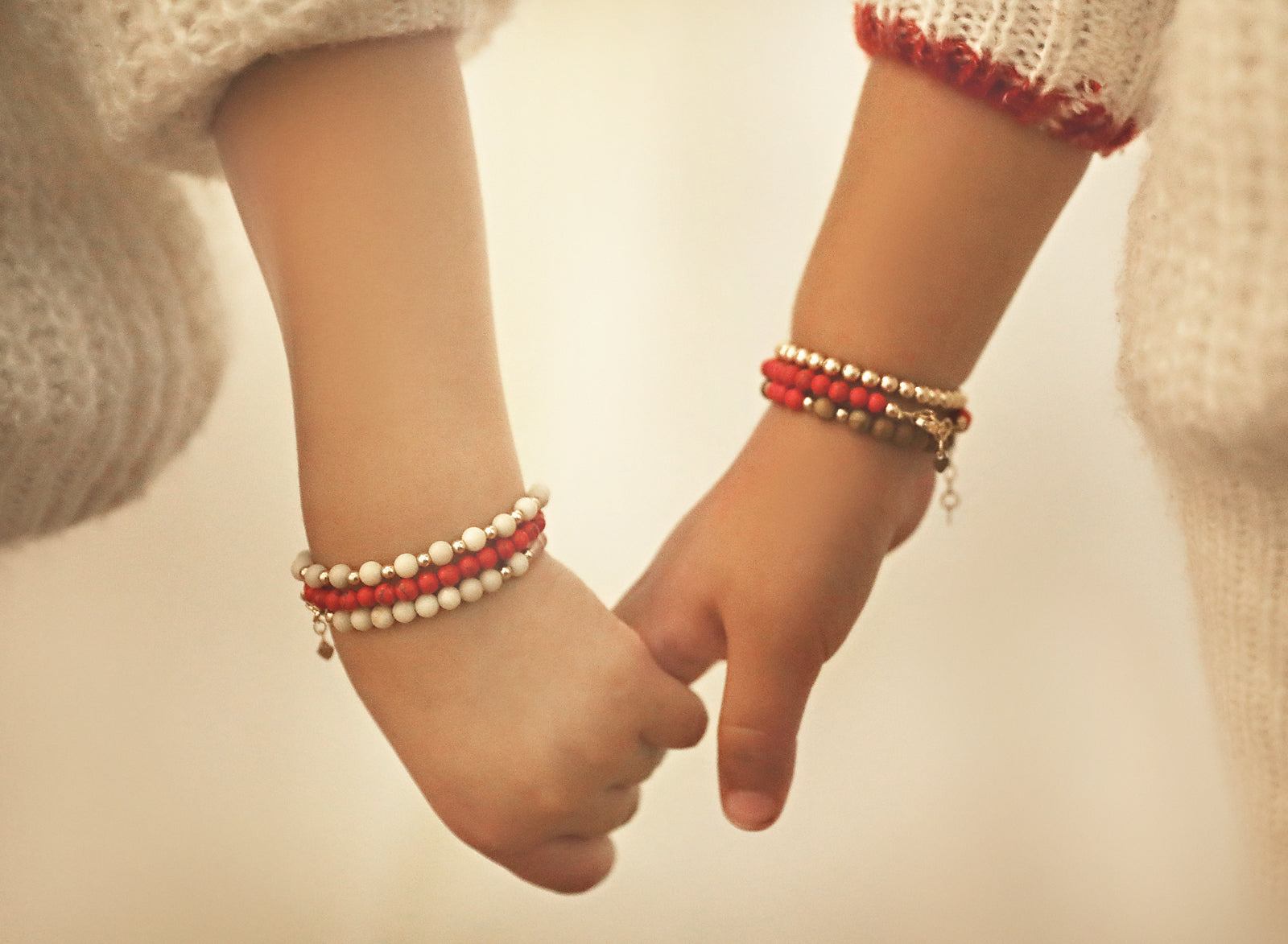 Red and gold beaded baby bracelet